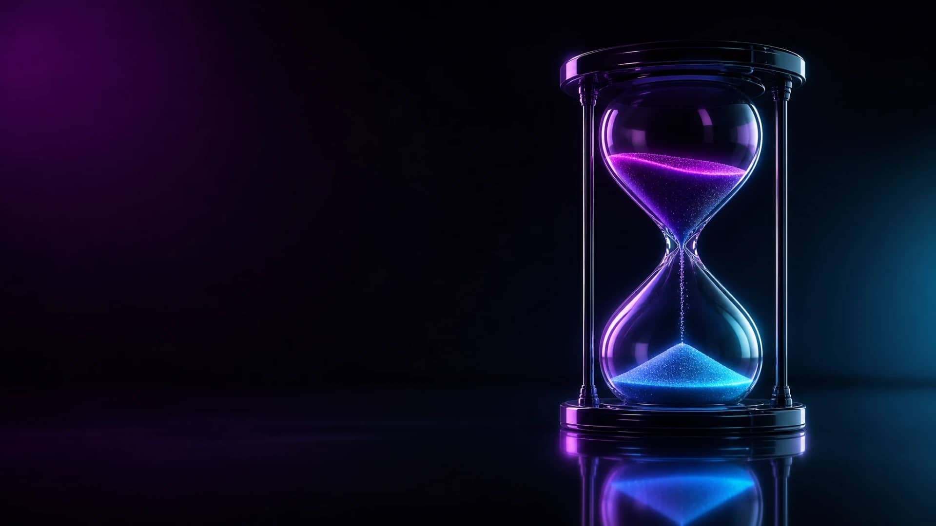 A slim glass hourglass on a black mirror floor, lit in magenta and cyan light